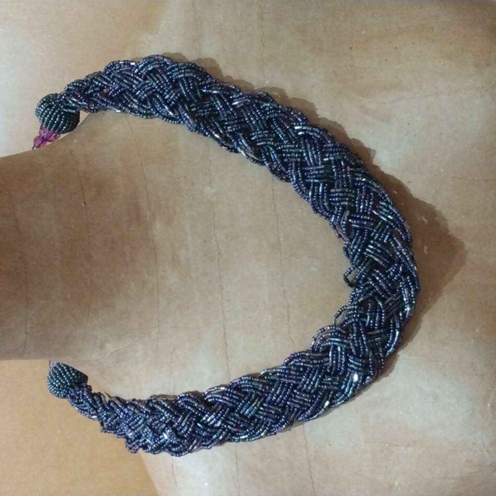 Braided multi-strand bead necklace